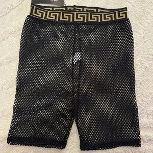 Black and gold fishnet mesh shorts